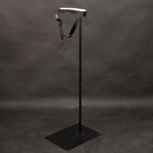 Stand with a strap attachment around the waist for flexible mannequins