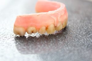 Dentures with rotten teeth