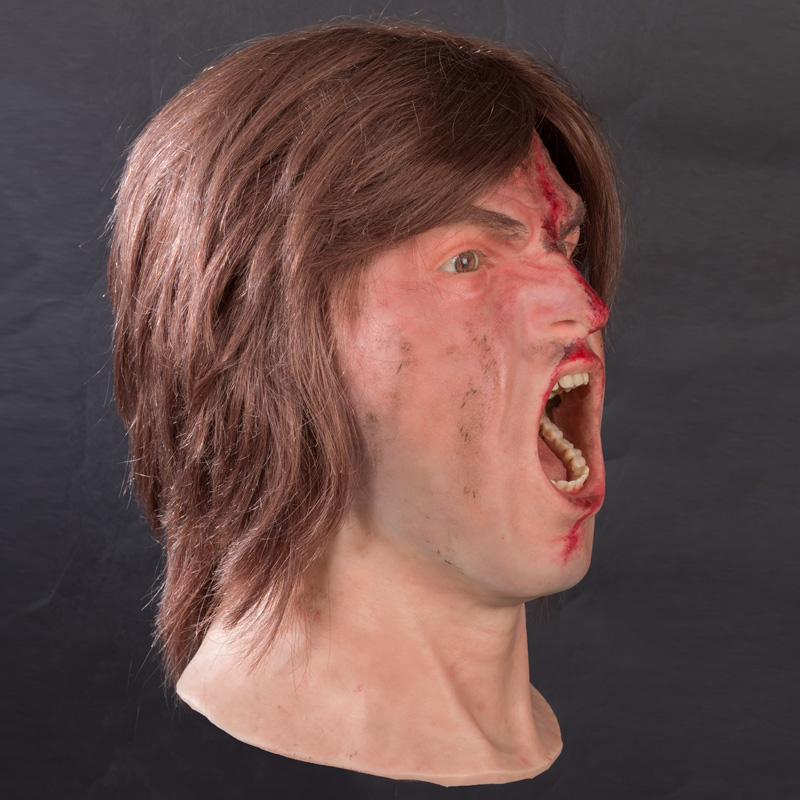Gewonde en schreeuwende man siliconen hoofd