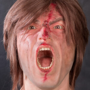 Gewonde en schreeuwende man siliconen hoofd