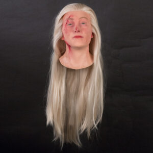 Realistic womens display mannequin head with wounds