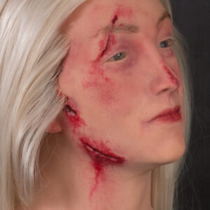 Realistic womens display mannequin head with wounds