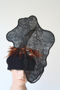 Display heads for presenting hats by Deksels Mooi