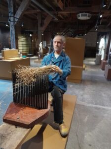 display mannequin working on flax processing