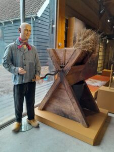 display mannequin working on flax processing