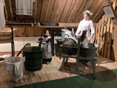 Mannequin of a maid in the upstairs room at the Goemanszorg museum farm